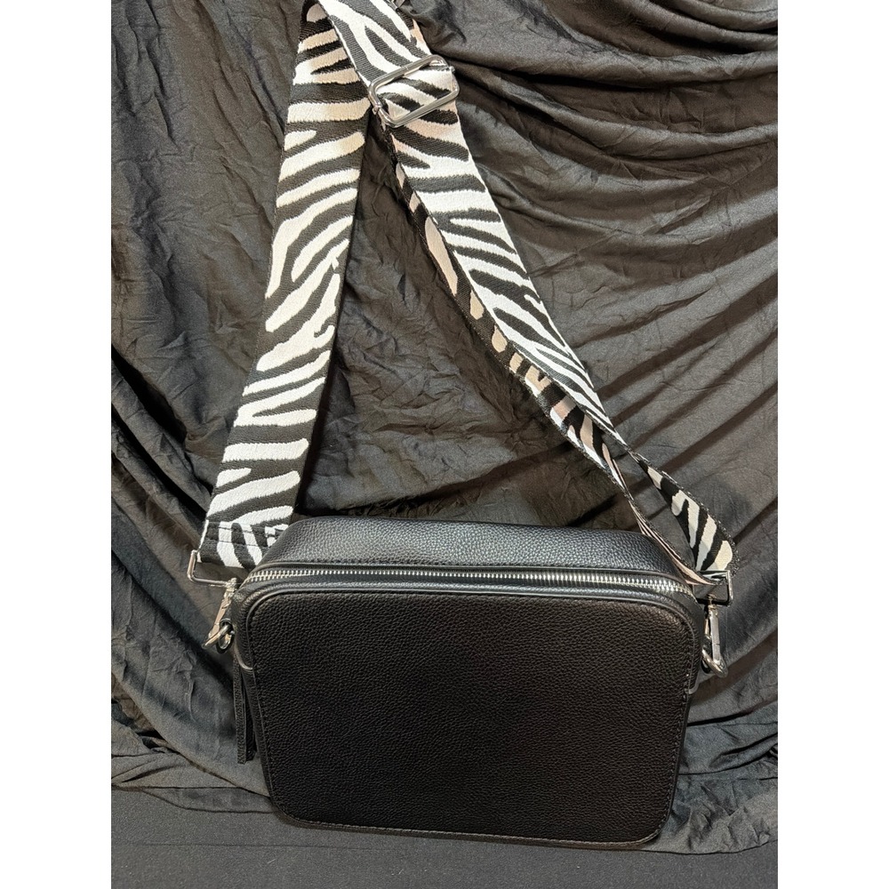 Pinafore Black Pebbled Crossbody Bag w/Zebra Print Guitar Strap Tassel Bag